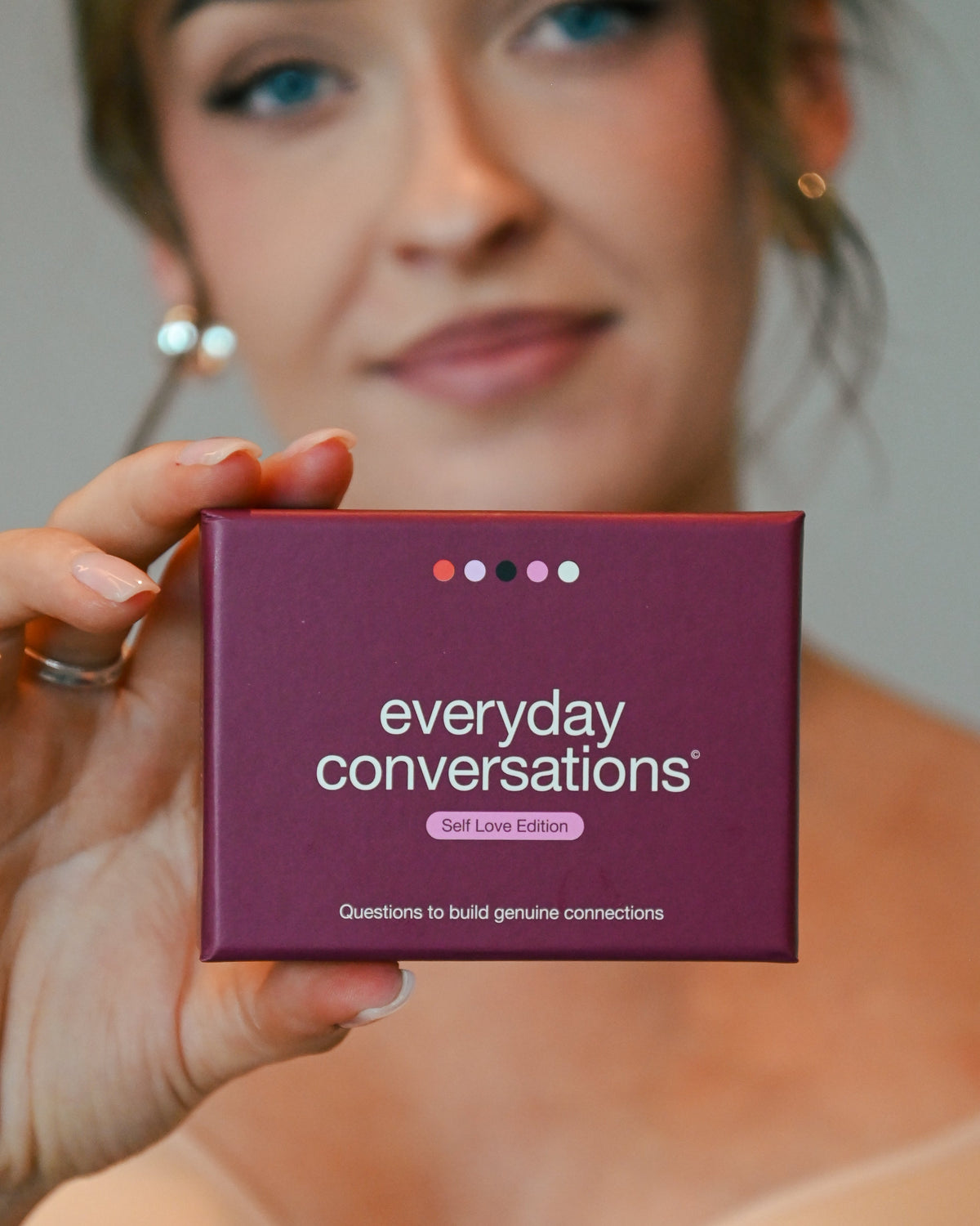 Close-up of Everyday Conversations Self Love Edition card pack, questions to build genuine connections